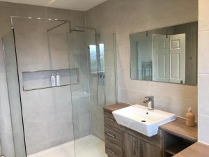 Renovated bathroom by complete upkeep